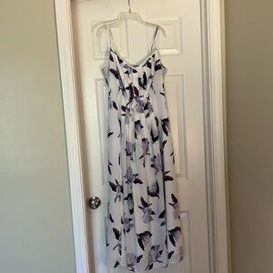 Banana Republic. White dress with purple flowers. Has pockets